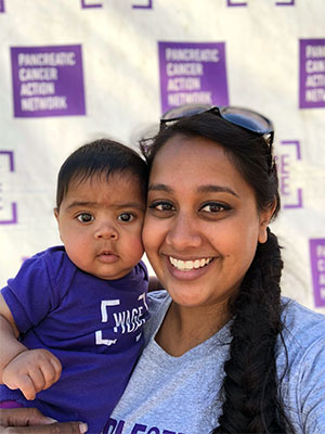 和她的孩子一起在旧金山的purple estride walk做志愿者，结束胰腺癌