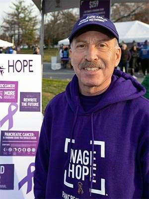 幸存者在新泽西紫跨筹款步行活动提高胰腺癌意识